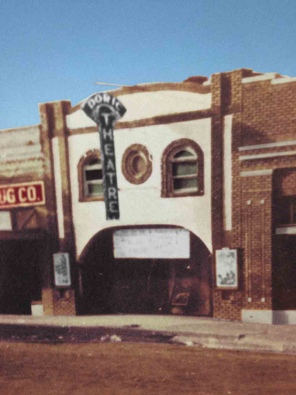 A colorized  picture of the Doric Theatre in the 1937
